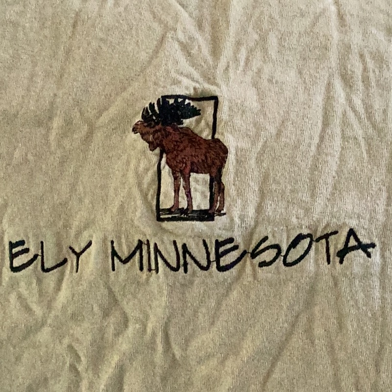 Ely Minnesota Moose Tee Sz Lg Tan Embroidered Unisex Euc